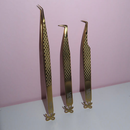 Gilded Bow Tweezer Collection